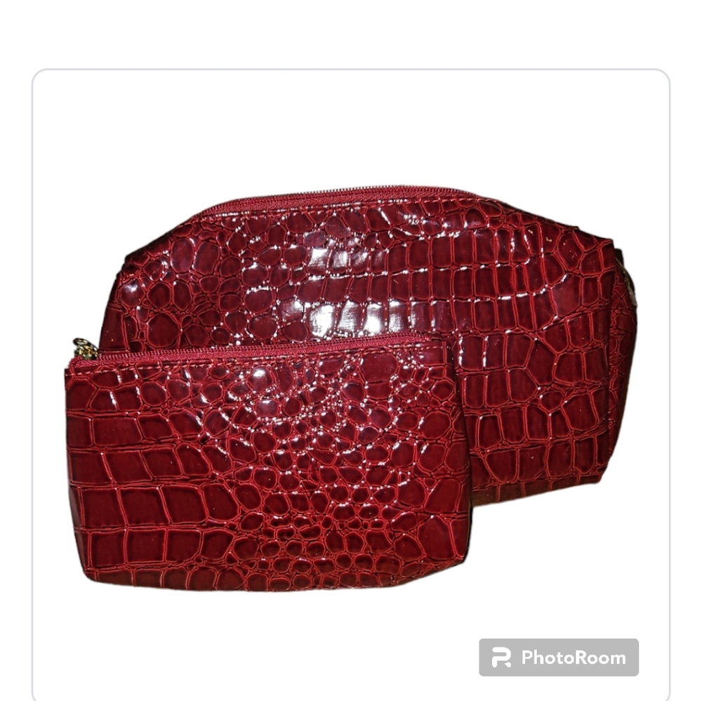 Estee Lauder makeup bag comes with a matching coin purse a raisin color NWOT